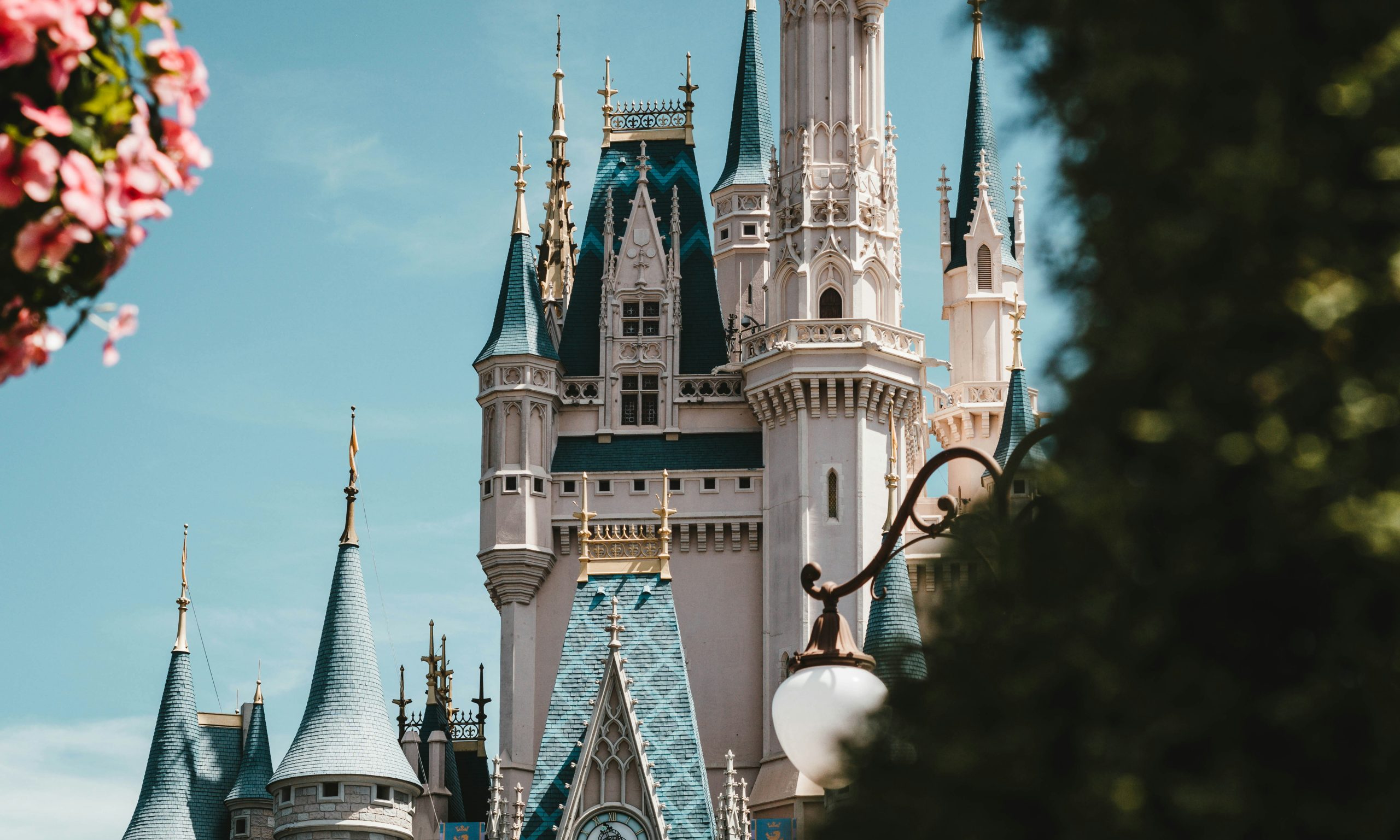 Get Audience Attention Through Storytelling - What Not to Do at Disney World - Photo via Unsplash of Disney castle architecture